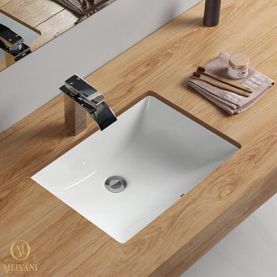 China Modern Bathroom Vanity Ceramic Oval Sinks Undercounter Basin With Overflow Hole for sale