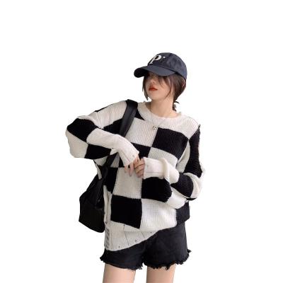 China Anti-wrinkle Checkerboard irregular holes loose pullover shoulder fashionable design sense pullover sweater top for sale