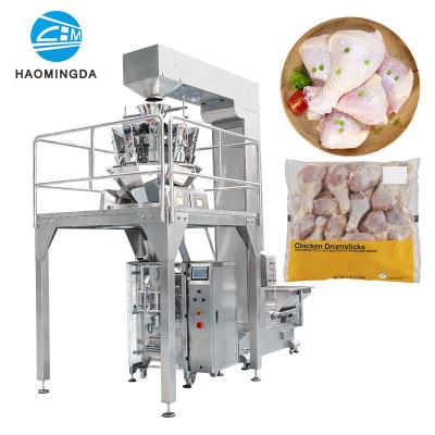 China Frozen Food Medium Frozen Meat Breast Claw Leg Wing Claw Chicken Automatic Weighing Regulating Packaging Machine for sale