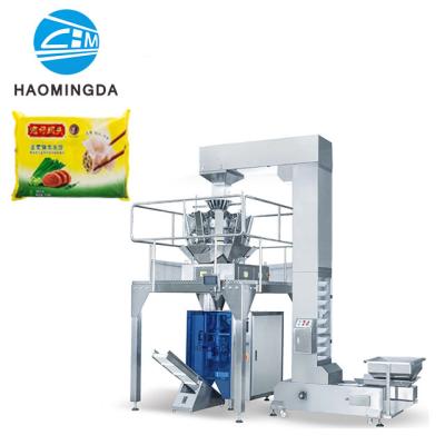 China Frozen Food Dumplings Cuttlefish Rice Ball Squishy Meatballs Stuff Balls Automatic Frozen Food Weigh Packaging Machine for sale