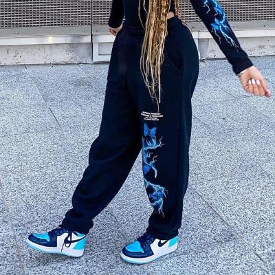 China 2021 New Girls Autumn Clothes Sports Pants Fashion Butterfly Lightning Letter Print Breathable Loose Waist High Long Track Pants Women for sale