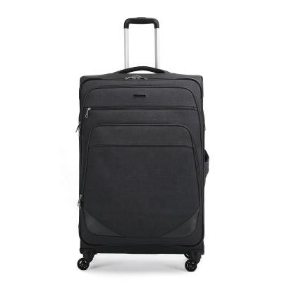 China Lightweight Polyester Travel Suitcases Box Wheel Spinner Cloth Trolley Luggage Suitcase for sale