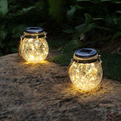 China Mason Jar Lights Mason Jar Ball Lights Warm Outdoor Solar Slit White Glass For Outdoor Decor for sale