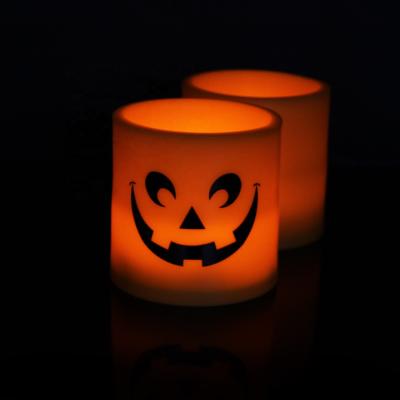 China Plastic flat led led pumpkin lamp orange pumpkin electronic candle electronic pumpkin lamp halloween candle for sale