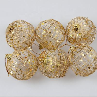 China High quality and environmental protection christmas tree pendant golden dusted christmas balls en venta