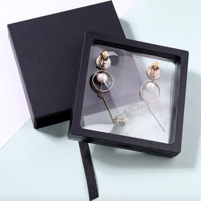 China Custom Floating Jewelry Storge Box Logo 3d Display Frame For Nail Necklace Ring Coin Transparent Bracelet Pe Film Hanging Gift Packaging Boxes for sale