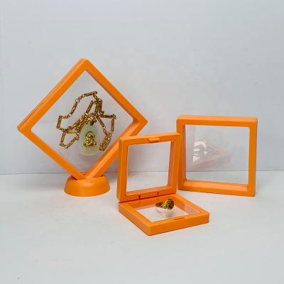 China Wholesale Up-to-date Orange Gem Stone Travel Organizer Packaging Jewelery Storge Box Promo Frame 3D Display Case Jewelry Coin Floating Box With Stands for sale