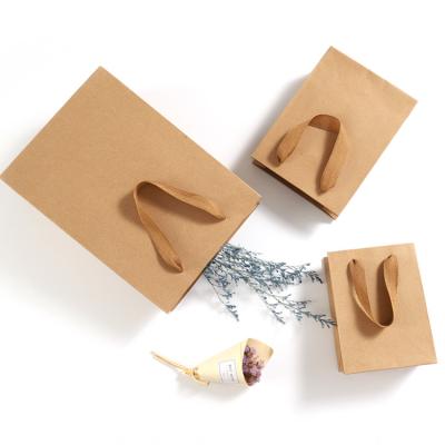 China Cheap Recyclable Kraft Paper Bag Gift Bag With Your OWN Logo Personal Wedding Ordinary Paper Shopping Paper Suitcase for sale