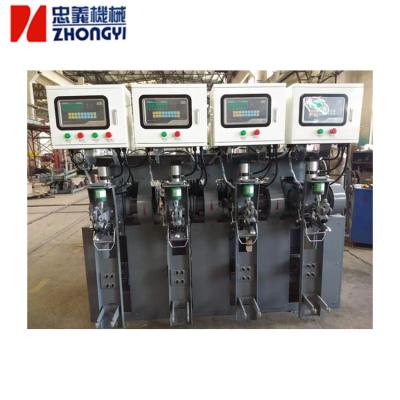 China Cement Packing Line Factory Price 4 Head 50kg Bag Cement Feeding Machine for sale