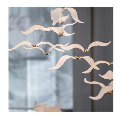 China Modern Front Hotel Lobby Acrylic Chandelier Art Bird Shaped Lighting Rotating Lobby Hotel Lobby Stair Lamp for sale