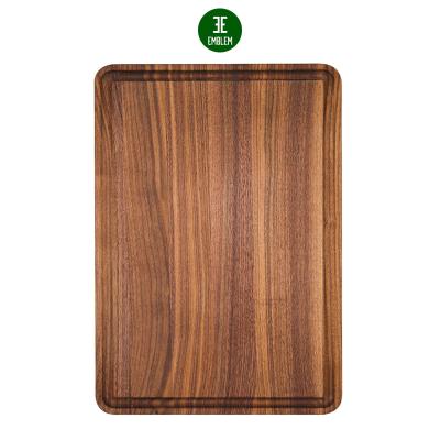 China Viable Walnut Wood Cutting Board For Kitchen Cheese Charcuterie Board Universal Reversible Butcher Block With Non Slip Mats for sale