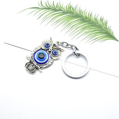 China Amazon Hot Selling Car Key Chain Bling Bling Crystal New Blue Glass Eyes Owl Lady Key Pendant Car Key Chain for sale