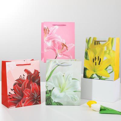 China Recycled Materials supply reasonable price custom paper bags for phones handle bread rope effectively  Ladies flowers mother lilies roses for sale