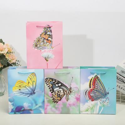 China Recycled Materials machine for shopping bag luxury paper bags with ribbon handle with logo and box flowers mothers tulips butterflies dancing for sale