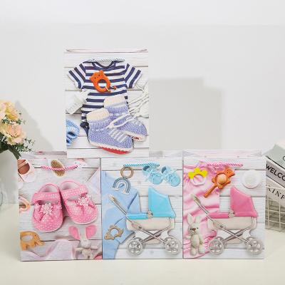 China Recycled Materials price luxury custom shopping packaging paper bag raw material roll for Born cartoon baby cradle cart with handle for sale