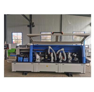 China Building material stores jidong double edge trimming automatic wood trimming machine for sale