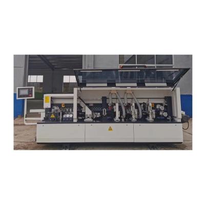 China Building Material Shops Trimmer Fully Automatic Double Plywood Linear Edge Banding Machine for sale