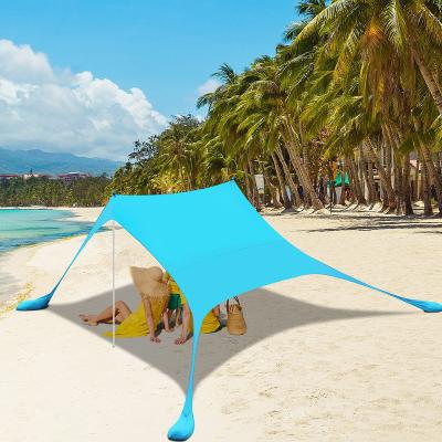 China Extended Type Factory Customized UV50 Portable Stretch Sun Shelter Tent Beach Sun Shelter With Sandbag Anchors And Peg Customized Sun Shelter Tent for sale