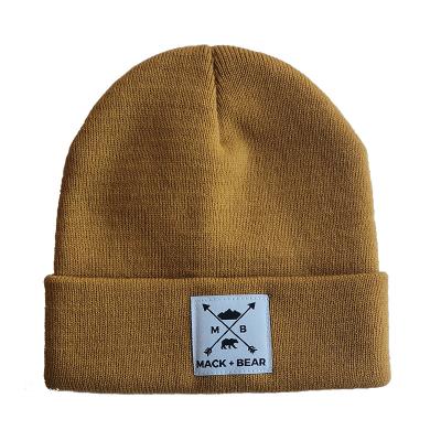 China Wholesale COMMON Custom Knitted Embroidery Patch Logo Warm Winter Hat Kid Size Slapped Beanie Kids Rolled Beanies for sale