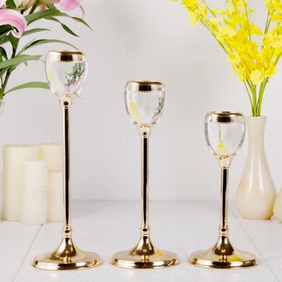 China Luxury Modern Unique Wedding Decoration Candlestick Holder Metal Gold Candlestick Home Decoration for sale