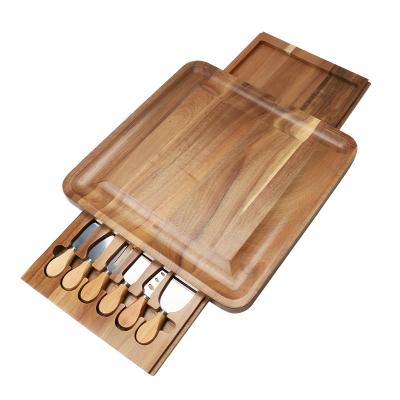 China Sustainable Extra Large Wooden Cheese Board and Knife Sets Wooded Acacia Charcuterie Boards with Drawers Serving Tray Cutting Board for sale