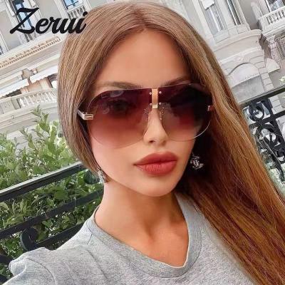 China Fashion Oversized Rimless Sunglasses Women Shape Round Sunglasses Men Stretch One Piece Sun Glasses For Women Rivet Oculos Glasses for sale