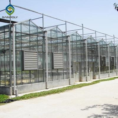 China High quality four-season turnkey modern glass structure fruit plant flower greenhouse price seed greenhouse glass for flower for sale