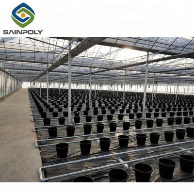 China Hot-dipped galvanized steel cheapest Sainpoly used galvanized steel greenhouse structure for sale for sale