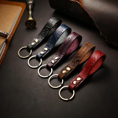 China Hot Selling White Car Gifts Leather Key Chain Embossed Genuine Leather Key Chain for sale