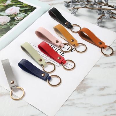 China Gifts Wholesale Custom Leather Blank Key Chain Logo Laser Print PU Leather Keychains In Bulk for sale