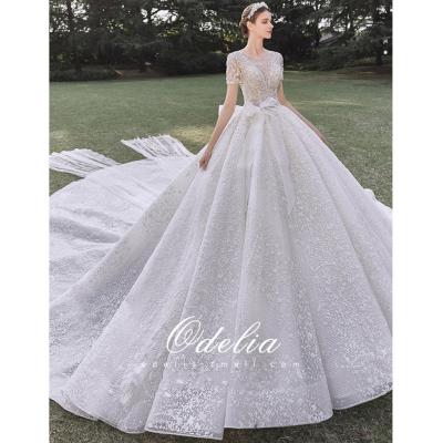 China Luxury Anti-Static Backless Wedding Dresses O Neck Lace Up Short Sleeves Princess Cathedral Train Bridal Gowns Applique Beadings Elegant for sale