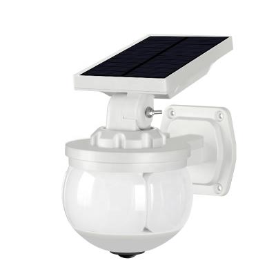 China Garden Solar Colorful Sparkle Light Solar Sensor LED Camera Motion Dummy Light for sale