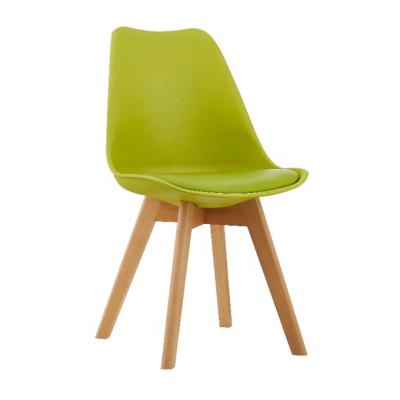 China Modern Hot Sale Removable Cover PU Leather Seat Tulip Plastic Cafe Dining Chair With Wooden Legs for sale