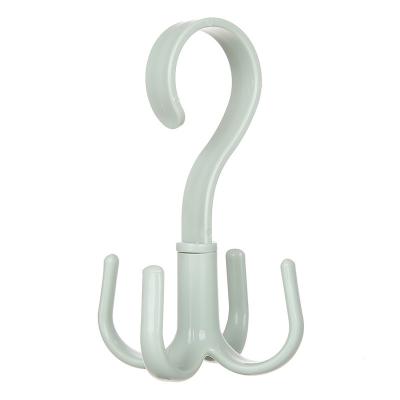 China Sustainable Household Creative Rotary 4 Prong Hook Storage Multifunctional Plastic Hanger for sale