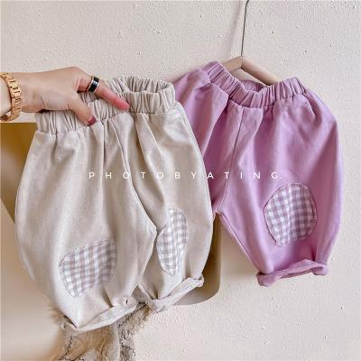 China Anti-wrinkle Autumn Girls Harem Pants Kids Long Rocket Pants With Patch for sale