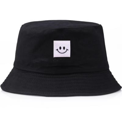 China Character Ready To Ship Woven Label Smile Face Plain Bucket Hat Chinese Supplier for sale