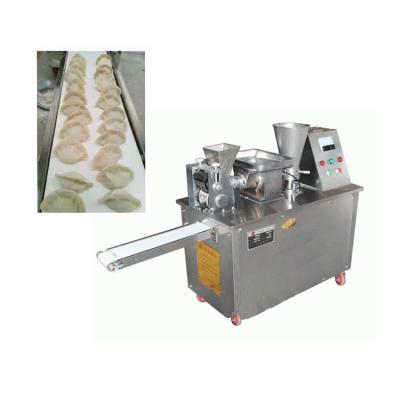 China INDUSTRIAL automatic dumpling wrapper machine / pierogi dumplings machine/spring roll making machine for sale