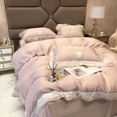 China Viable Solid Color 60s Lenzing Tencel Silk Soft Solid 4 Piece Bedspread Quilt Cover Bedding Lace Bear Embroidery Solid Set for sale