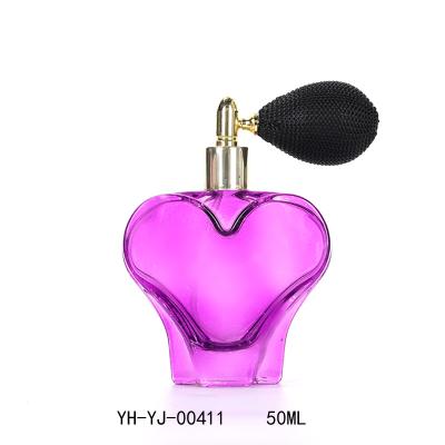 China YJ-00411 fashion accessories luxury glass perfume bottle 50ml unique heart-shaped glass perfume bottle for sale