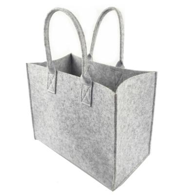 China Recyclable Large Volume Thick Felt Handmade Magazine Storage Bag Tote Shopping Handbag Fashion High End Customized Reusable for sale