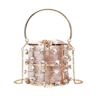 China Fashion Metal Bucket Bag Crystal Wedding Clutch Purse Evening Hollow Bag For Women Party Luxury Small Handbag With Handle for sale