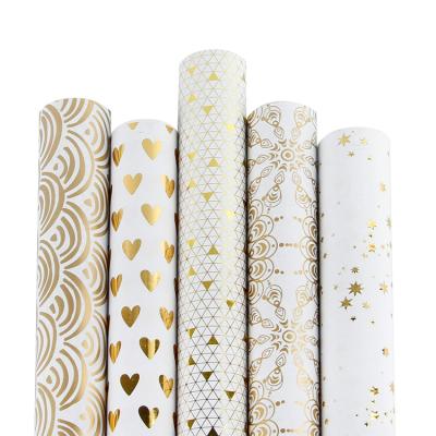 China Customized Waterproof Gold Foil Pattern Print White Gift Wrapping Paper With Roll Wrapping for sale