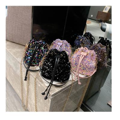 China Fashion Women Fashion Sequin Drawstring Chain Shoulder Handbag Simple Pumping Ladies Mini Bling Bucket Purses for sale