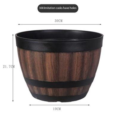 China CLASSIC high quality durable PE round vintage imitation whiskey 12 inch plastic flower pot for sale