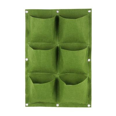 China Eco-Friendly Recycle 6 Pockets Green Grow Vegetable Garden Vertical Planter Bags Seedling Bag Wall Hanging Plant Growing Bags for sale