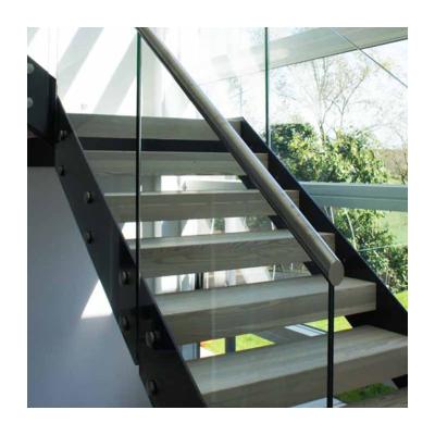 China Modern modern villa staircase design with double steel beam curved staircase and straight glass balustrades for sale