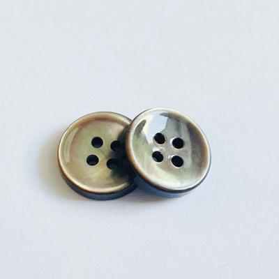 China Washable Natural Black Pearl Shell Buttons 4 Holes Broom Black Shirt Button for sale