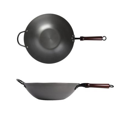 China Minimalist Kitchen Cooking 1.5mm Thickness Carbon Steel Wok With Comfortable Cast Iron Handle for sale