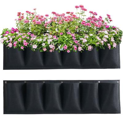 China Grow Plants Recycled 6 Pockets Wall Hanging Grow Bag Felt Vertical Garden Planter For Growing Container Bags for sale