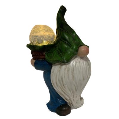 China Europe Garden Decoration Resin Gnome Figurine Carrying Magic Globe With Solar LED Lights for sale